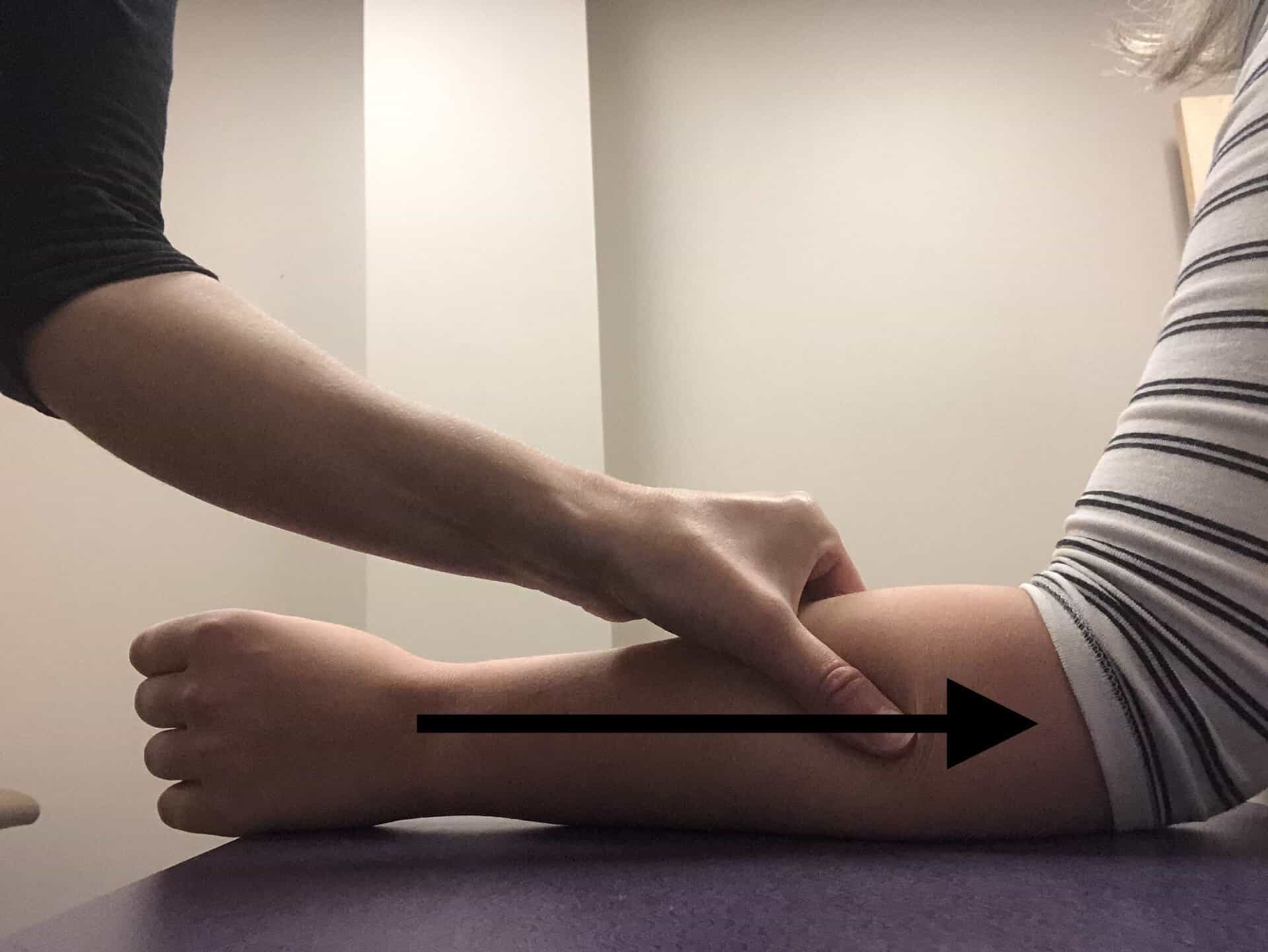 Hand therapy session for fly fisher's elbow injury in Alaska.