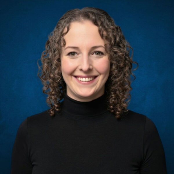Alaska Hand Rehab therapist Maggie D. smiling, providing hand therapy services in Anchorage, Alaska.